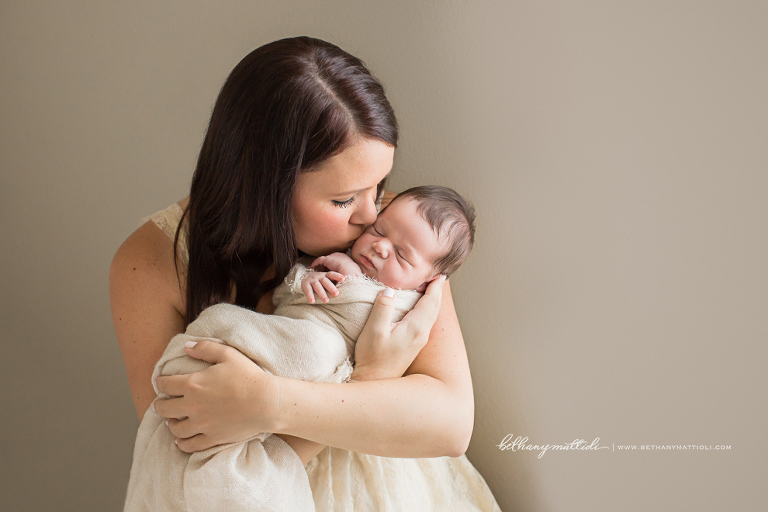 Mother holding newborn | Bethany Mattioli Photography - Bay Area Newborn Photographer