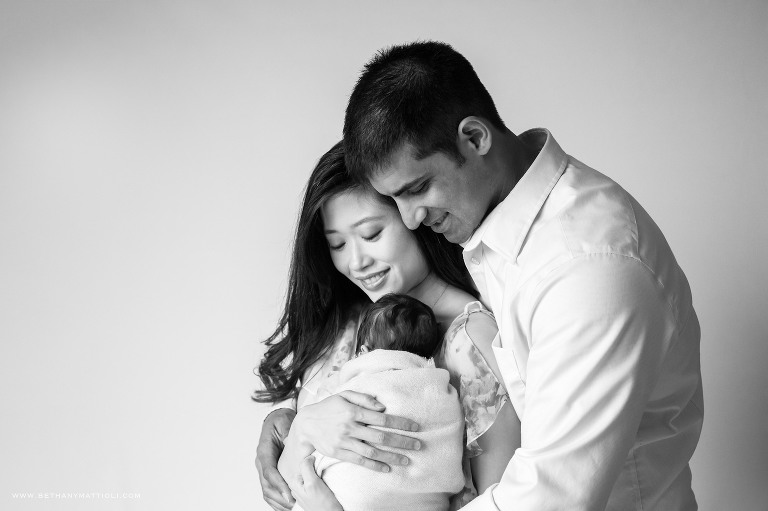 Black and White Photo of Newborn with Parents | Simple and Timeless Newborn Photography | Newborn Photography in the Bay Area | Bethany Mattioli Photography