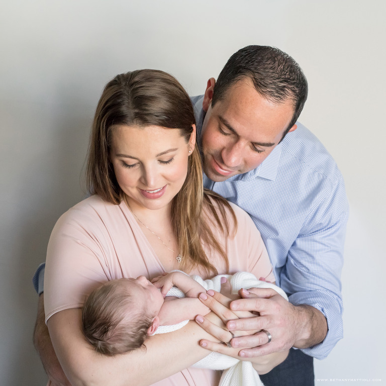 Parents holding newborn baby boy Newborn Photographers San Jose | Bethany Mattioli Photography
